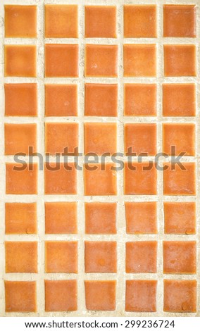 Orange old square tile texture of wall and floor, tile interior of bathroom, pool, kitchen.