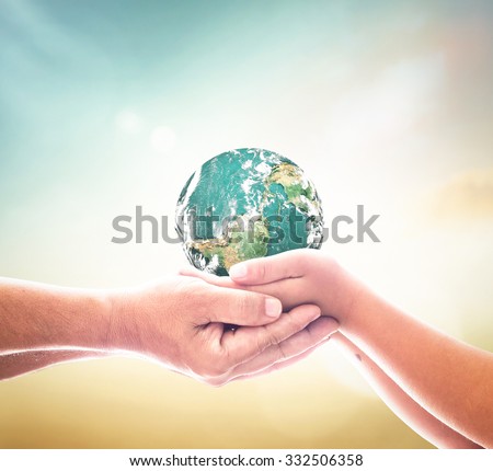 Planet in hands. Human Rights Mission Cancer CSR Earth Hour Adam Autism Global Charity Youth Service Save Life Religion Share Trust First Save Bank concept. Elements of this image furnished by NASA