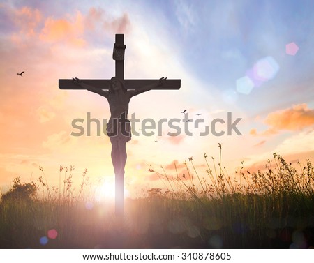 Silhouette Jesus Christ with cross on blur beautiful autumn sunset with amazing light background. Thanksgiving, Redeemer, Forgiveness, Mercy, Repentance, Adoration, Glorify, Love, Grace, Bible concept
