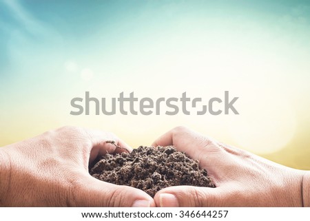 Closeup heart shape of hands for soil. World Soil Day, Soils a solid ground for life, Ecology, World Environment Day, Investment, health care, Beginning, Trust, Start, CSR, Eco Friendly concept.