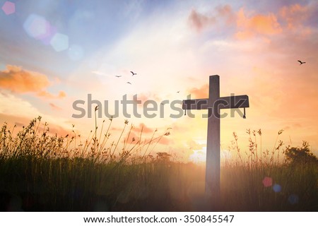 Silhouette cross on blur beautiful autumn sunset with amazing light background. Merry Christmas Card Thankful Adoration Glorify Peace Evangelical Hallelujah Blessing Amen Hope Religion concept