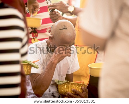 PATTANI,THAILAND DECEMBER 19 : Male who will be monk cut hair for be Ordained. Thailand on december 19, 2015