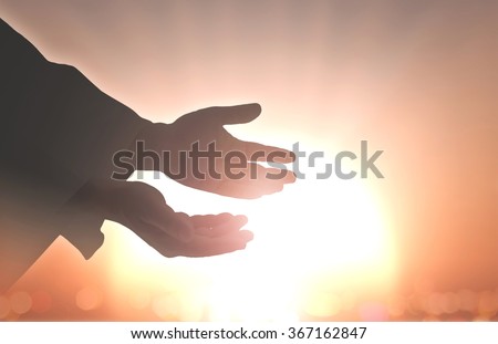 Silhouette human hand open palm up. Mercy Humble Repentance Reconcile Adoration Glorify Christmas Redemption Redeemer Eucharist Year 2016 Love Jesus Christ Blessed God Hope Help Christian Give concept