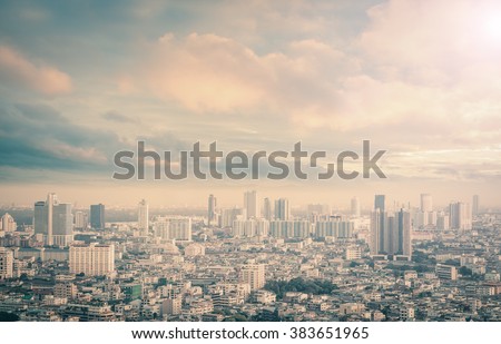 Vintage style. Aerial view of Bangkok skyline on amazing beauty golden warm light sunrise. Beautiful hotel, resident of Bangkok city, Thailand, Asia. Insurance, Investment, industry concept.