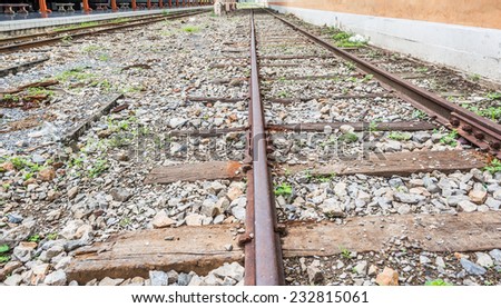 image of Railway lines travel through a railway station.