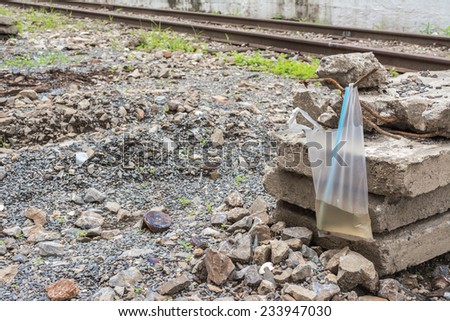 image of plastic bag and rail way .