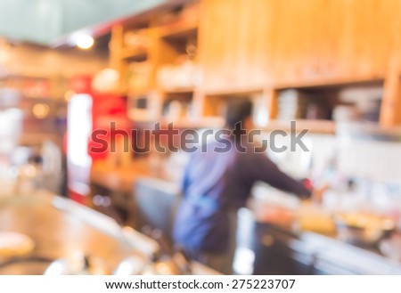 blur image of Japanese chef making food in kitchen for background usage.