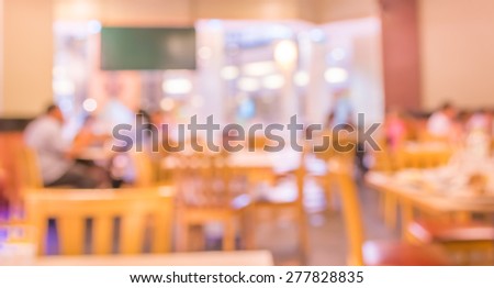 blur image of Coffee Shop Blurred background with bokeh .