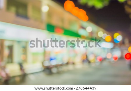 image of Bokeh of supermarket light at night for background usage.