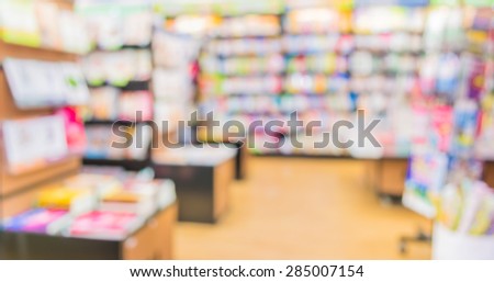 blur image of   book store on shelf at shopping center forbackground usage.