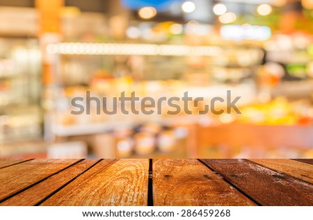 blurred image of  bakery shop for background usage.