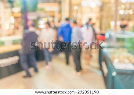 image of blur people at pet show  for background usage .