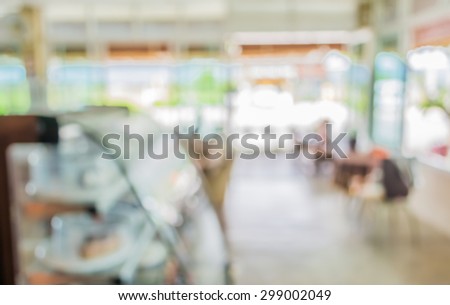 image of blur bakery shop with bokeh for background usage.