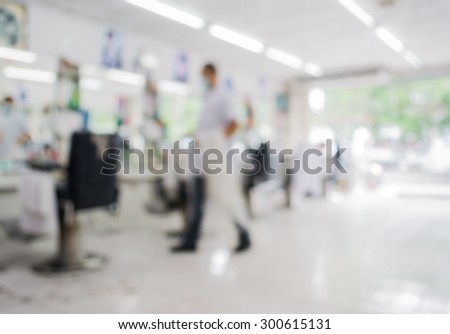 blur image of people at haircut shop for background usage.