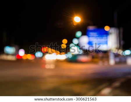 image of blur street  bokeh  with warm colorful lights in night time for background usage .