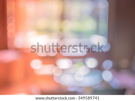 image of blur living room with bokeh for background usage . (vintage tone)