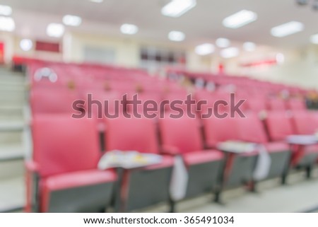 blurred image of empty auditorium room , Abstract blur for background usage.