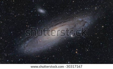 M31 Andromeda Galaxy, and it\'s satellites M32 and M110 small elliptical galaxies.