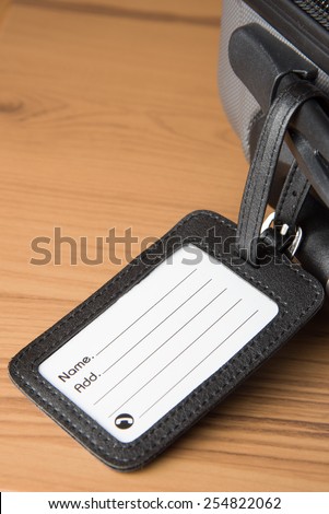 Blank Luggage Tag on wooden table
