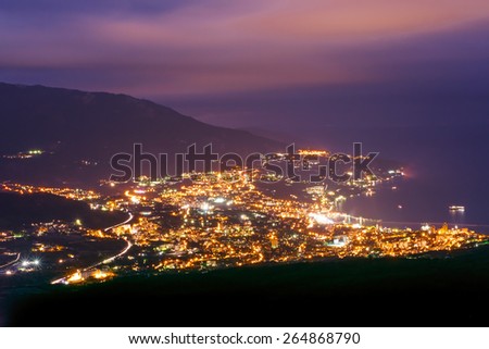 Night city near sea. Yalta. Black sea. Russia. Ukraine.