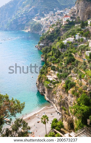 Quiet and picturesque Arienzo Beach, near Positano, Amalfi Coast, Italy, people relaxing, swimming and sunbathing