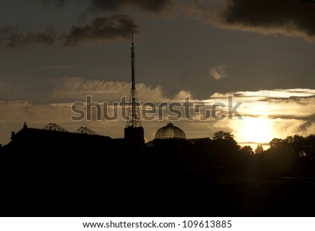 August 2012. Alexandre Palace, Wood Green, London, England. TV Broadcasting station, Sunset, silhouette tower dome
