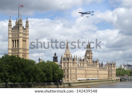 June 2013 Queens Birthday Flypast an Airbus A330 tanker aircraft in company with two Typhoon FGR.4s  and two Tornado GR.4s  Royal Air Force overhead the Houses of Parliament. London, England.
