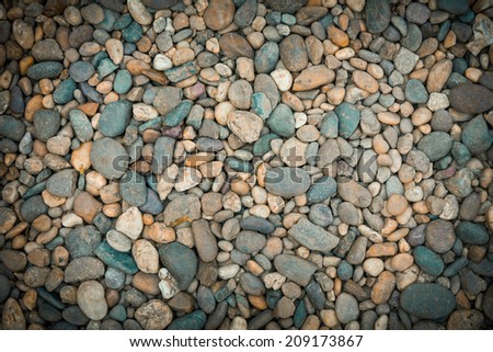 A lot of gravel on the ground background