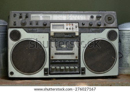 ancient  radio on steel floor