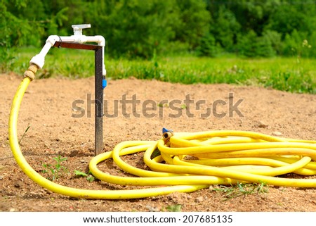 Water tap with garden hose