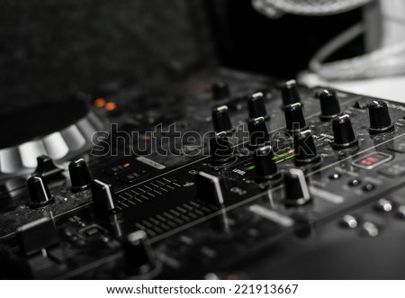 DJ drives buttons in black and white
