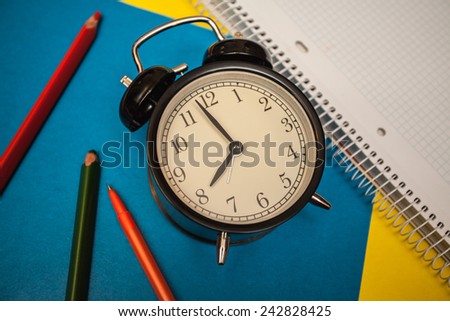 service time while clock morning beginning colored pencils notebook book workbook exercise book copybook  paper pen
