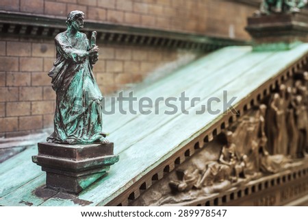 copper and patina statue