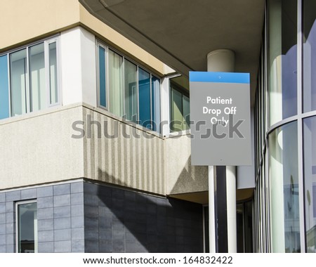 Patient Drop-Off sign outside hospital entrance