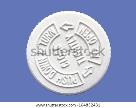 Safety cap for prescription pill container