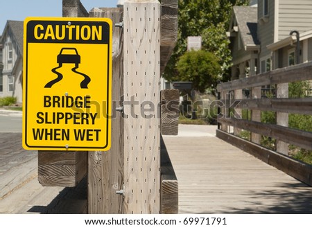 Warning sign of slippery bridge
