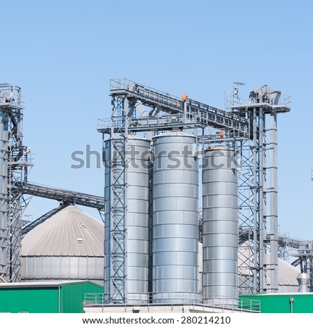 Storage facility cereals and production of bio gas; silos and drying towers
