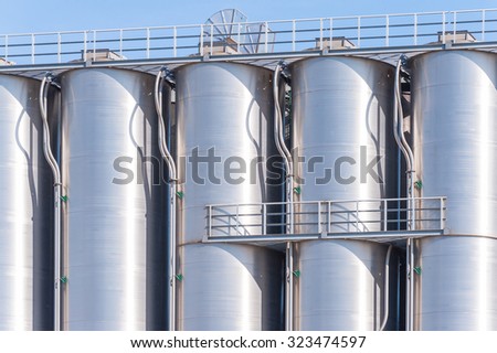 Detail of chemical plant, silos and pipes