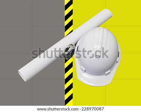 hard hat with blueprints