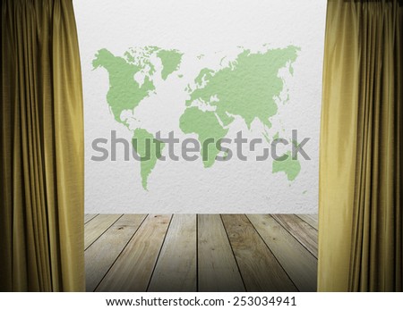 gold curtains on white wall texture and green map of the world with wooden paving.