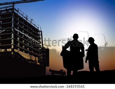 silhouette man engineer looking blueprint in a building site over Blurred construction site