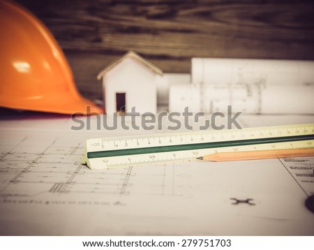 Architectural blueprint of office building with a pencils