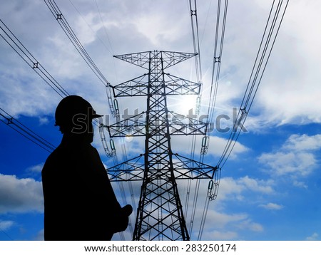 silhouette man of engineers standing at electricity station