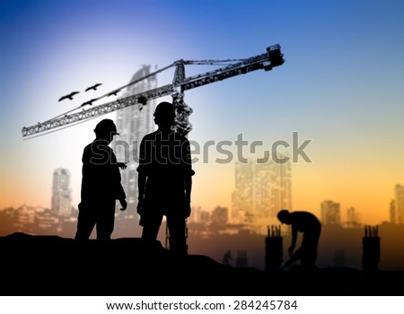 silhouette engineer construction site over Blurred construction worker on construction site