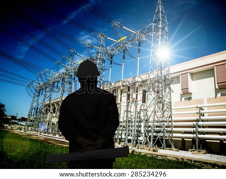 silhouette man of engineers standing at electricity station