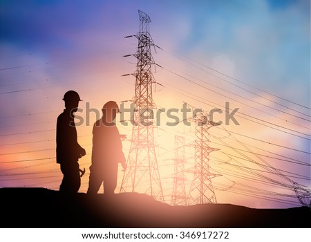 silhouette engineer working  in a building site over Blurred construction worker on construction site