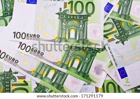 Many euro banknotes making european currency background