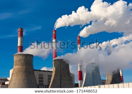 Industrial smoke rising from Power Station Cooling Towers Industrial smoke rising from Power Station Cooling Towers