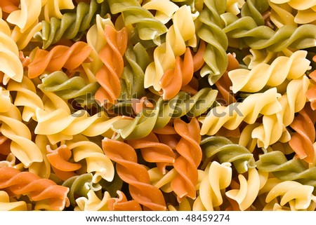 Raw italian pasta isolated on white background