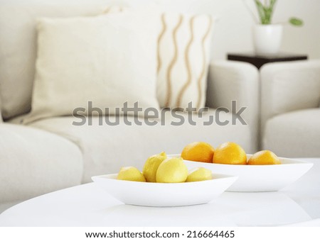 Lemon and orange on center table